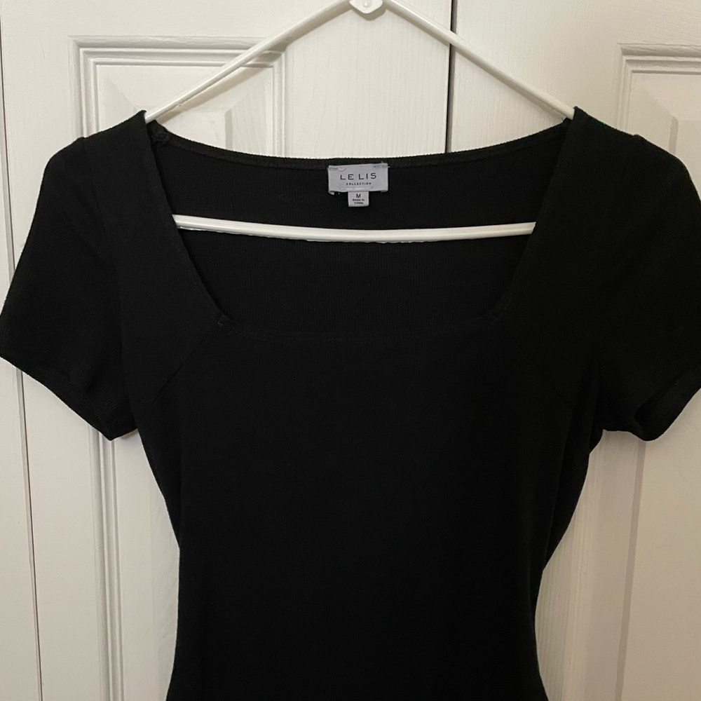 Medium square neck black body suit.